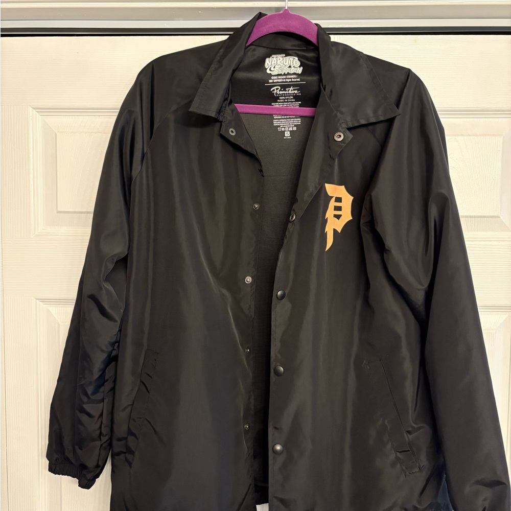 Primitive Black Windbreaker with Gold Logo
